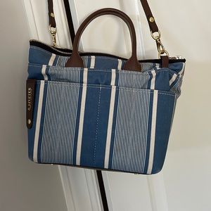 Riveter purse in blue stripes with brown leather trim.